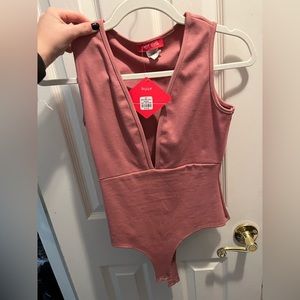 Dark pink body suit